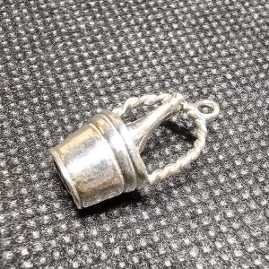 Silver Champagne Bottle in a Champagne Bucket.