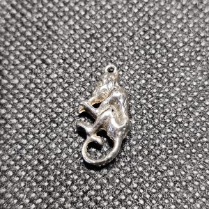 Silver Charm of a Monkey playing a Penny Whistle